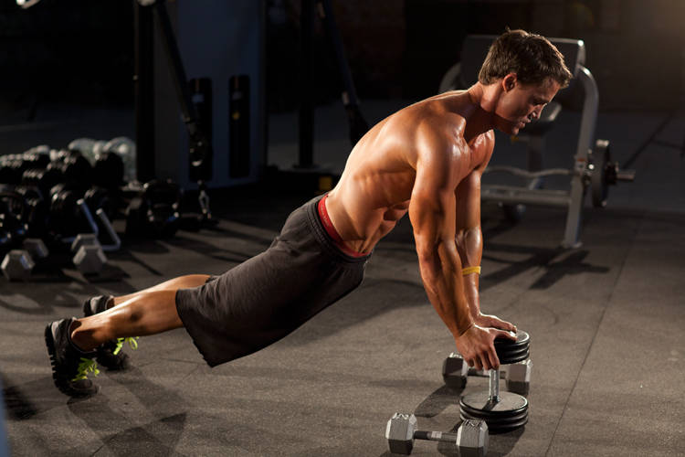 Close-Grip Push-Up off of a Dumbbell demonstration