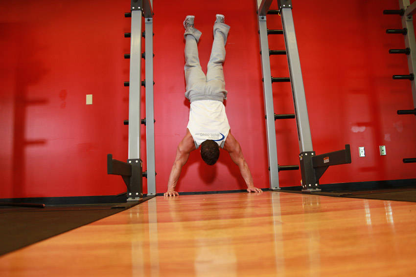 Handstand Push-Ups demonstration frame 1