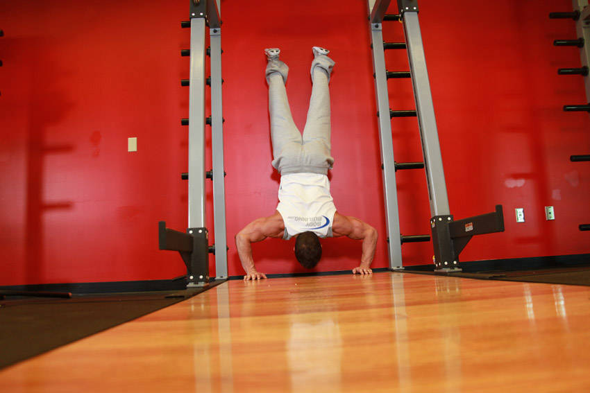 Handstand Push-Ups demonstration frame 2
